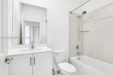 Stunning and modern two-story townhouse located in the highly - photo 1