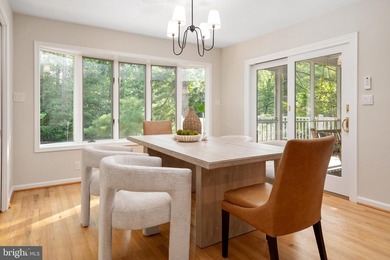 Perfectly positioned on a beautifully landscaped corner lot in - photo 9