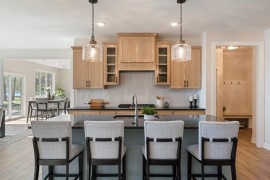 Enjoy lake living with sunrise and sunsets & new construction - photo 19