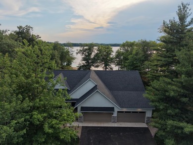 Enjoy lake living with sunrise and sunsets & new construction - photo 48