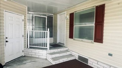 This charming 2-bedroom, 2-bathroom plus den mobile home offers - photo 2