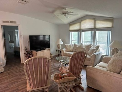 This charming 2-bedroom, 2-bathroom plus den mobile home offers - photo 6