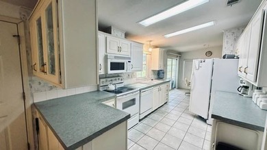 This charming 2-bedroom, 2-bathroom plus den mobile home offers - photo 7