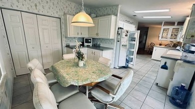 This charming 2-bedroom, 2-bathroom plus den mobile home offers - photo 8