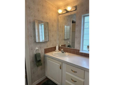 This charming 2-bedroom, 2-bathroom plus den mobile home offers - photo 10