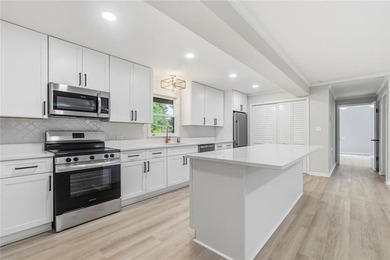 Welcome to this beautifully renovated brick ranch nestled on a - photo 16