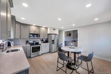 Welcome to this stunning expanded split level residence nestled - photo 16