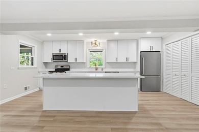 Welcome to this beautifully renovated brick ranch nestled on a - photo 17