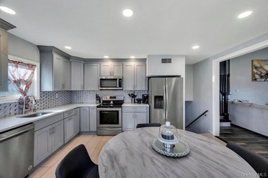 Welcome to this stunning expanded split level residence nestled - photo 17