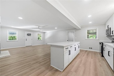 Welcome to this beautifully renovated brick ranch nestled on a - photo 21