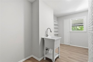 Welcome to this beautifully renovated brick ranch nestled on a - photo 28