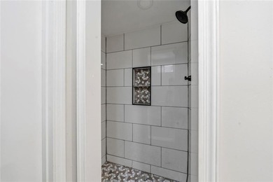 Welcome to this beautifully renovated brick ranch nestled on a - photo 37