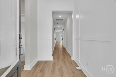This beautifully designed one-story home welcomes you with an - photo 4