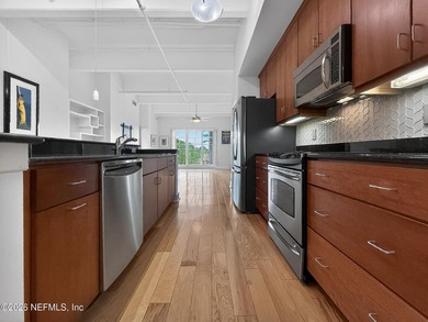 Enjoy sophisticated Riverside living in this spacious loft-style - photo 7