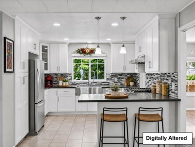 Welcome to this beautifully updated 3 bedroom, 2 bath residence - photo 3