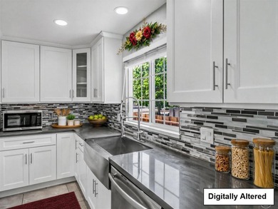 Welcome to this beautifully updated 3 bedroom, 2 bath residence - photo 6