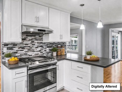 Welcome to this beautifully updated 3 bedroom, 2 bath residence - photo 7