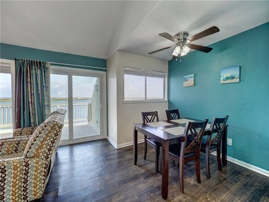 Positioned on the second floor, this waterfront retreat captures - photo 11