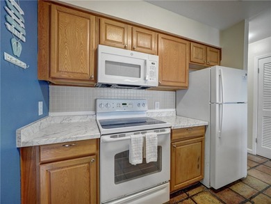 Positioned on the second floor, this waterfront retreat captures - photo 13