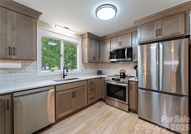 Looking for the perfect waterfront retreat? Tucked along the - photo 13