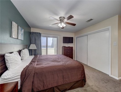 Positioned on the second floor, this waterfront retreat captures - photo 16