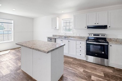 Welcome to this beautifully designed Champion Lake Manor model - photo 9