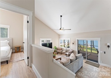 Looking for the perfect waterfront retreat? Tucked along the - photo 20