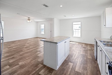 Welcome to this beautifully designed Champion Lake Manor model - photo 10