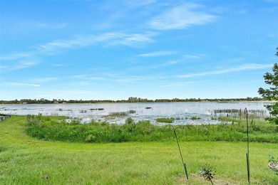 Welcome home to this true piece of *Old Florida* lake front - photo 3