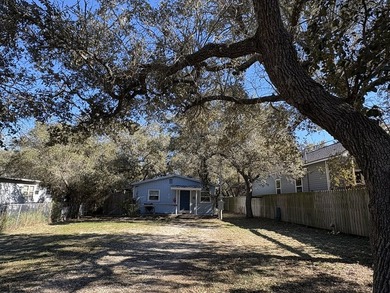Hang up your fishing poles and settle into this charming coastal - photo 3