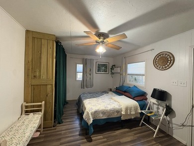Hang up your fishing poles and settle into this charming coastal - photo 8