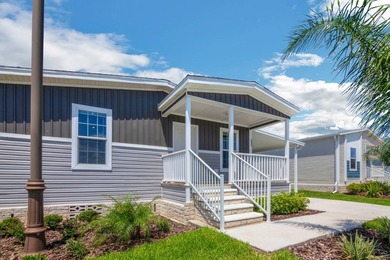 Welcome to this beautifully designed Champion Lake Manor model - photo 1