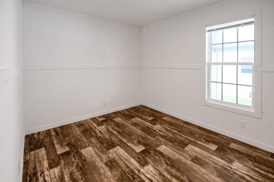 Welcome to this beautifully designed Champion Lake Manor model - photo 6