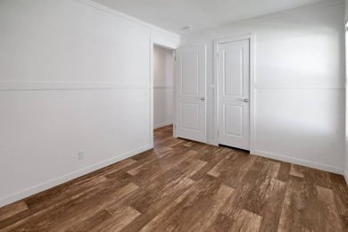 Welcome to this beautifully designed Champion Lake Manor model - photo 9