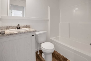 Welcome to this beautifully designed Champion Lake Manor model - photo 10