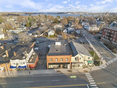 INVESTORS TAKE NOTICE: 1 retail and 8 residential units (9 units - photo 1