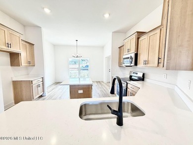 This beautifully designed 4 bedroom, 2 bath home blends modern - photo 3