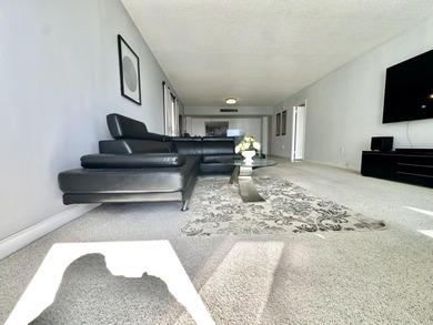 The oceanfront two-bedroom, two-bath residence combines a highly