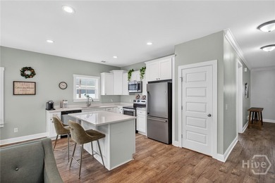 Welcome to this 3-bedroom, 2-bath home offering 1,588 square - photo 5