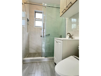 New updated bathroom 5/1/2026! Beautiful garden apartment with - photo 10