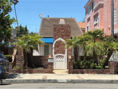 Just three blocks from the sand, this charming home is located - photo 1