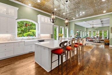 Beautiful nearly new custom built brick & stone home overlooking