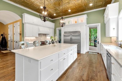 Beautiful nearly new custom built brick & stone home overlooking