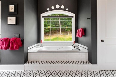 Beautiful nearly new custom built brick & stone home overlooking