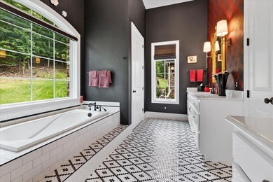 Beautiful nearly new custom built brick & stone home overlooking