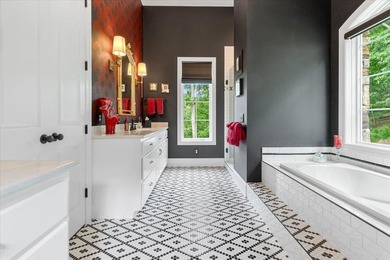 Beautiful nearly new custom built brick & stone home overlooking