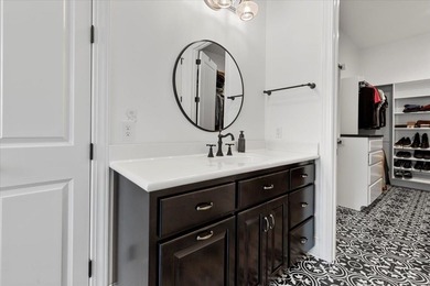 Beautiful nearly new custom built brick & stone home overlooking