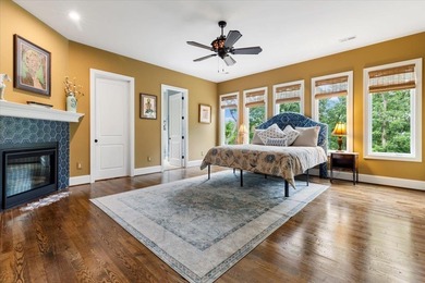 Beautiful nearly new custom built brick & stone home overlooking