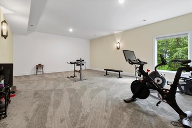 Beautiful nearly new custom built brick & stone home overlooking