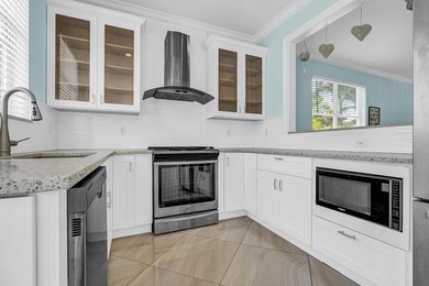 Welcome to this stunning waterfront residence in Thoroughbred - photo 2